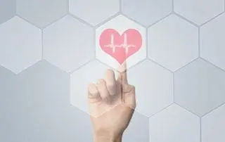 Doctor using modern computer for cardiac health