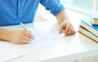 Close-up of student carrying out test at lesson