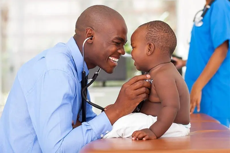 male nurse with baby